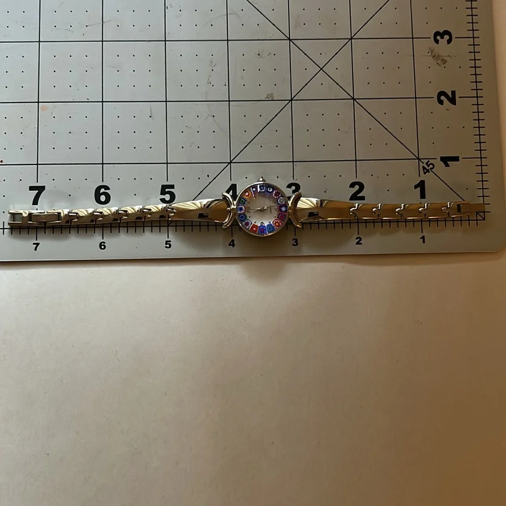 Avon Silver Watch with Colorful Dial